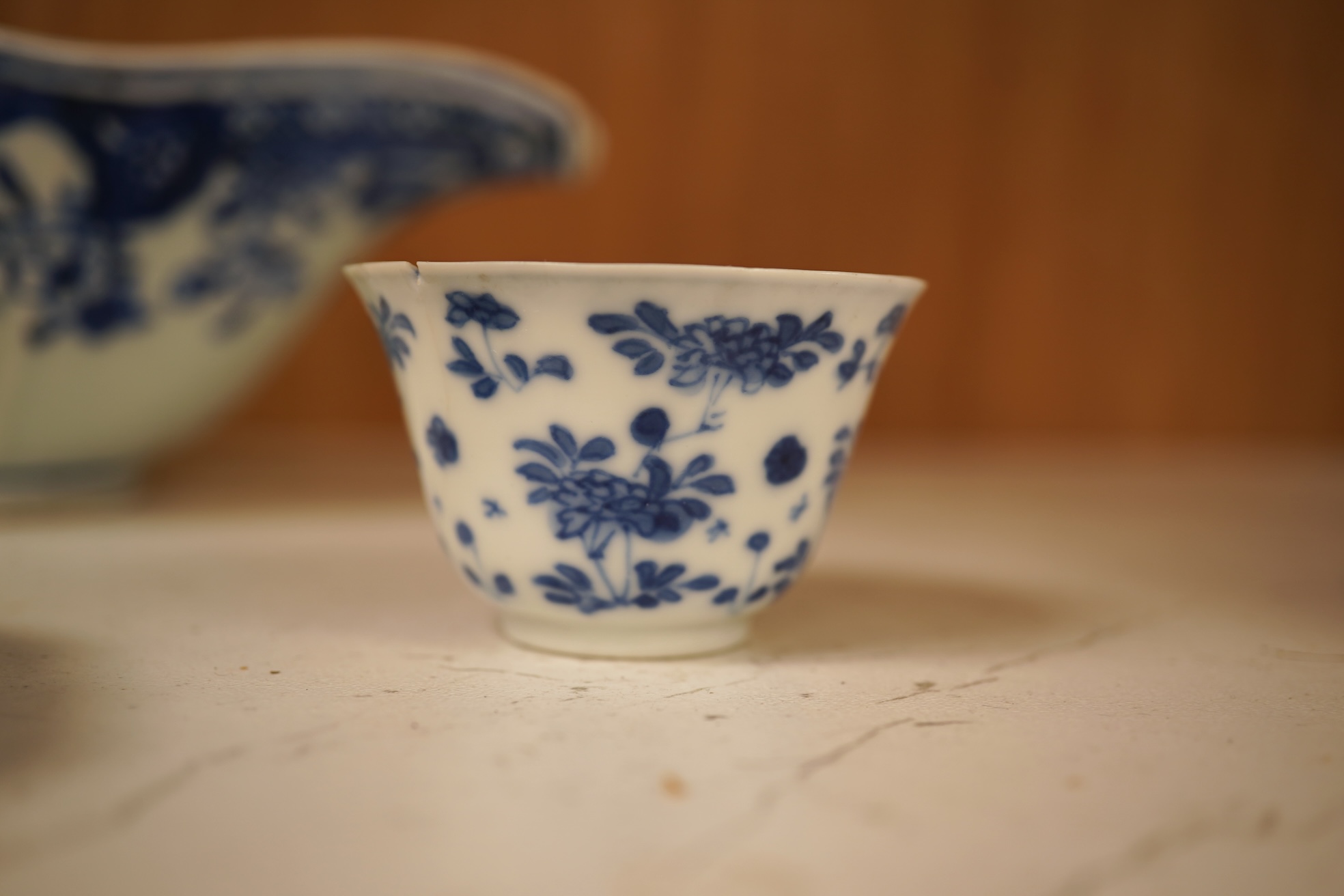 A Chinese export blue and white blue plate, sauceboat and Ko-sometsuke type dish together with a miniature tea bowl and two saucers. Plate 22cm diameter